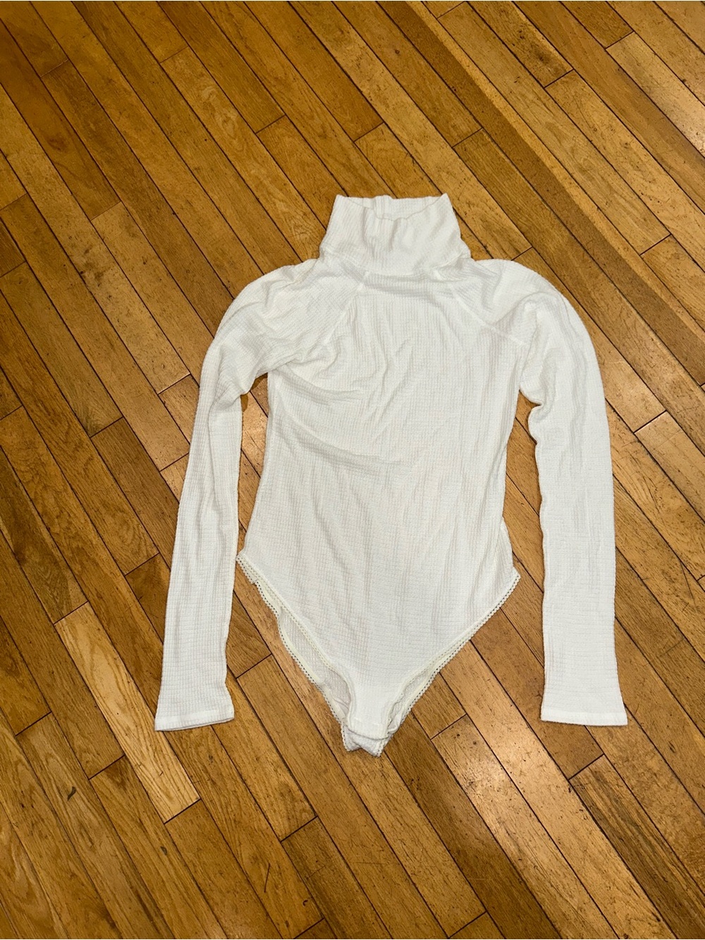 Woman’s Free People long sleeve bodysuit waffle